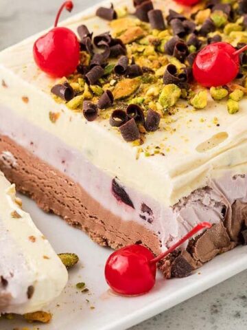 An image of a Spumoni - a colorful classic Italian-American layered ice cream dessert.