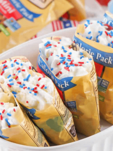 Red, White, and Blue Walking Pretzel Salad in a white baking dish.