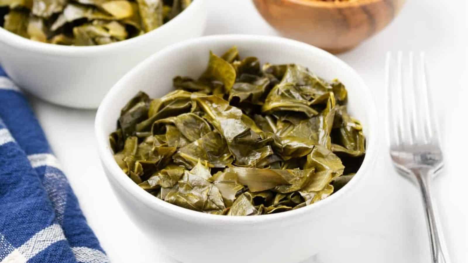 A close up image of slow cooker collard greens in a bowl.