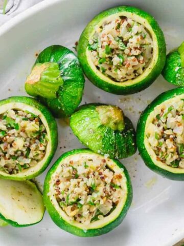 An overview of four Stuffed Round Zucchini.