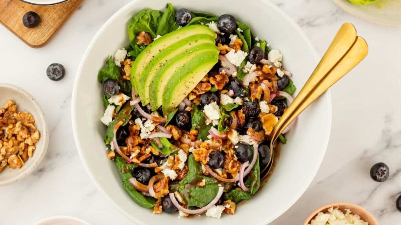 An overhead image of serving the salad in a bowl.