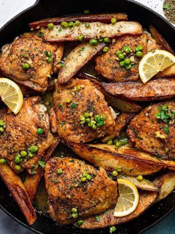 An overview of Chicken Vesuvio surrounded by ingredients.