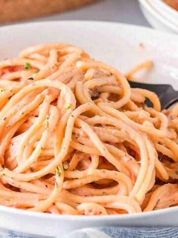 A bowl of Pink Pasta Sauce with a fork.