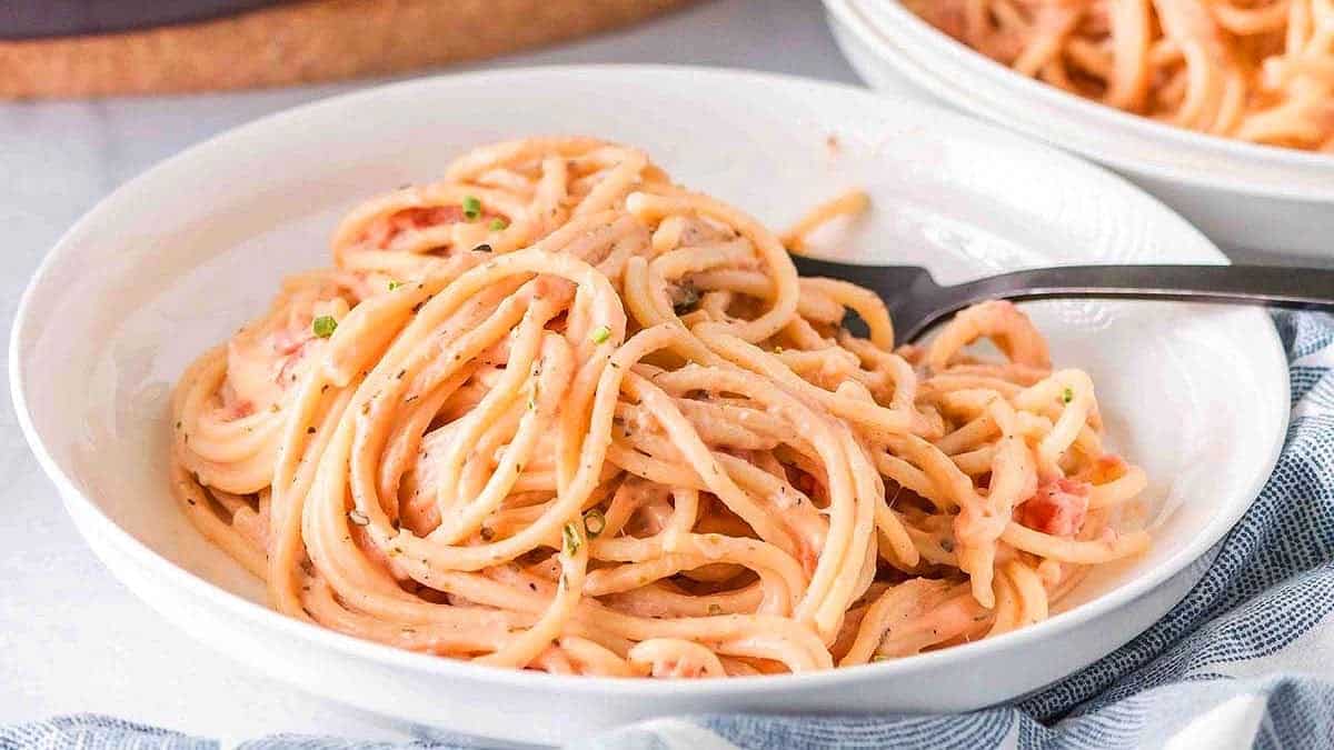 A bowl of Pink Pasta Sauce with a fork.