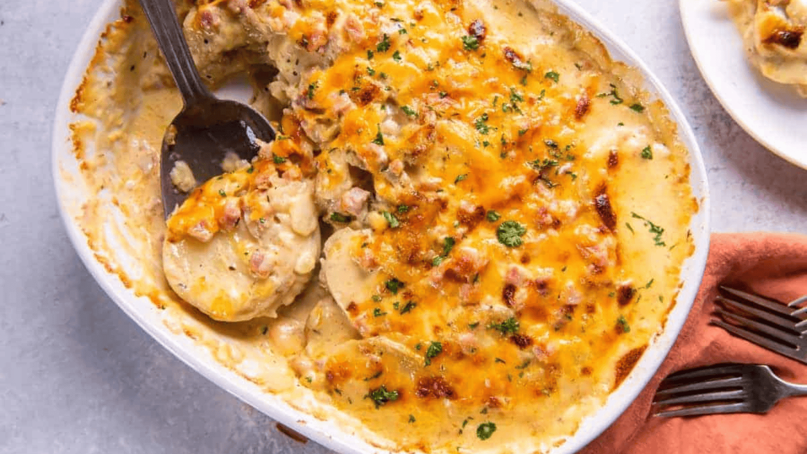 An overhead shot of Scalloped Potatoes and Ham.