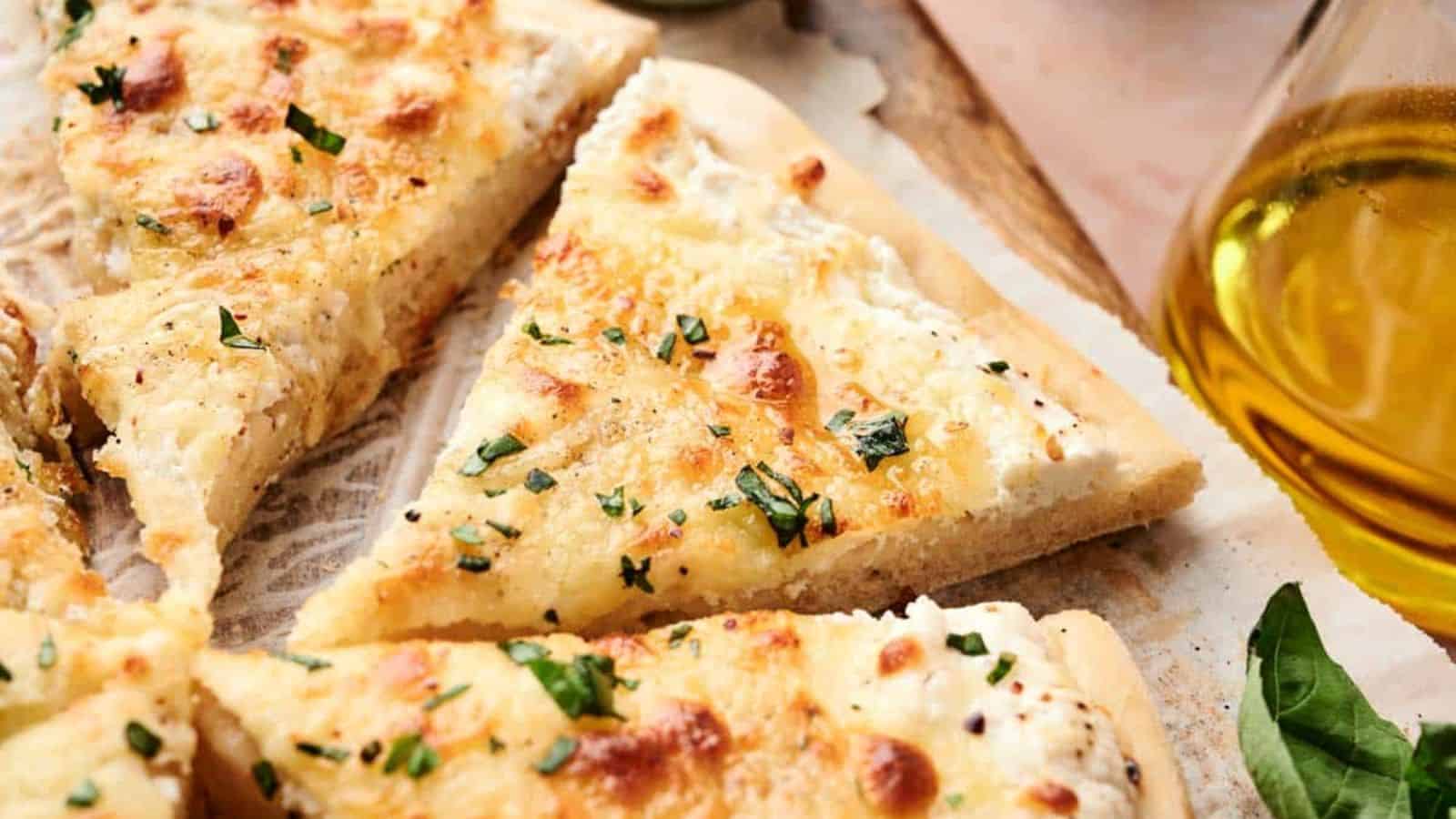 A close-up of White Pizza slices.
