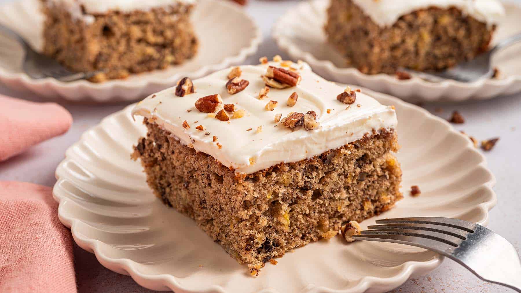 A slice of Apple Sheet Cake on a plate.