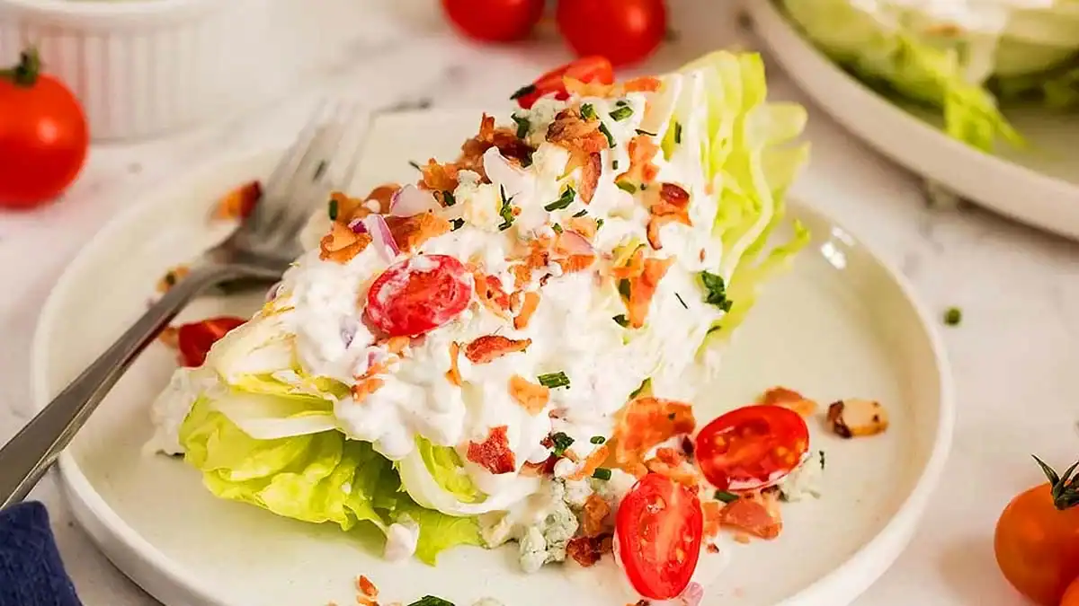 A plate of Iceberg Wedge Salad.