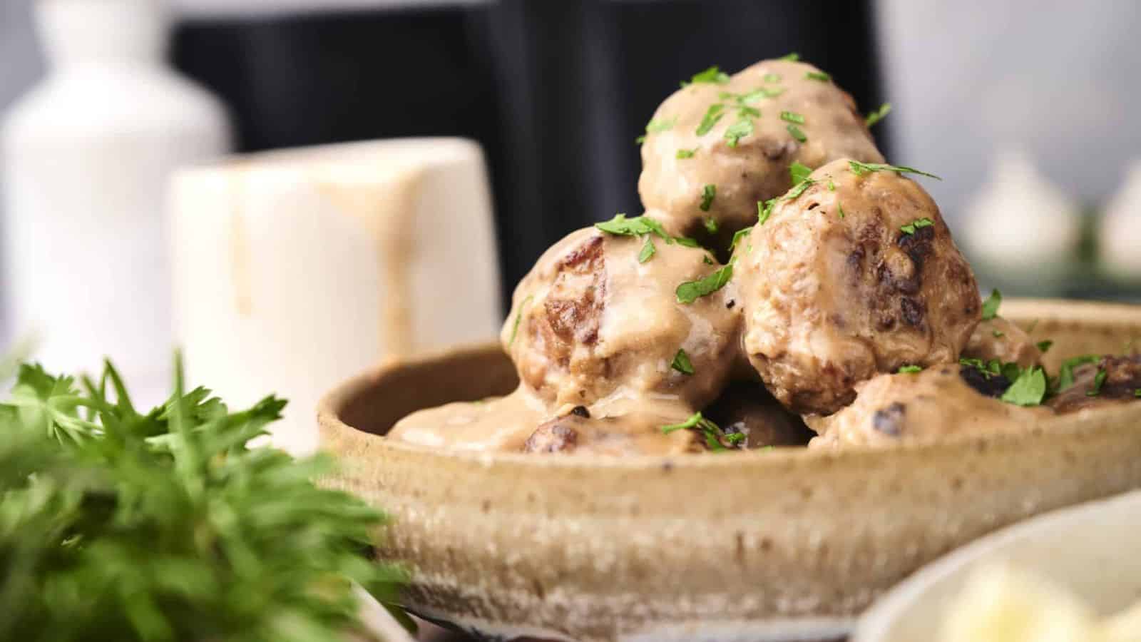 A stack of Air Fryer Swedish Meatballs on bowl.