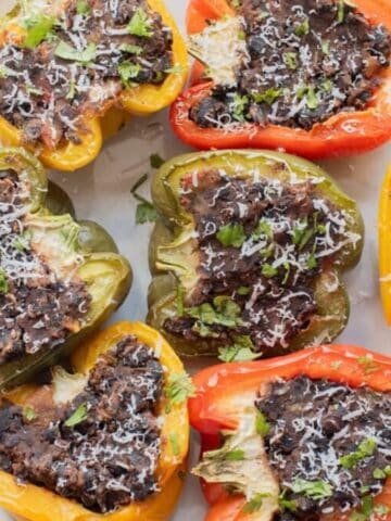 Close-up image of a plate black bean stuffed peppers.