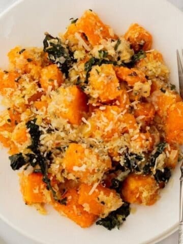 An overhead image of savory butternut squash casserole on a plate.