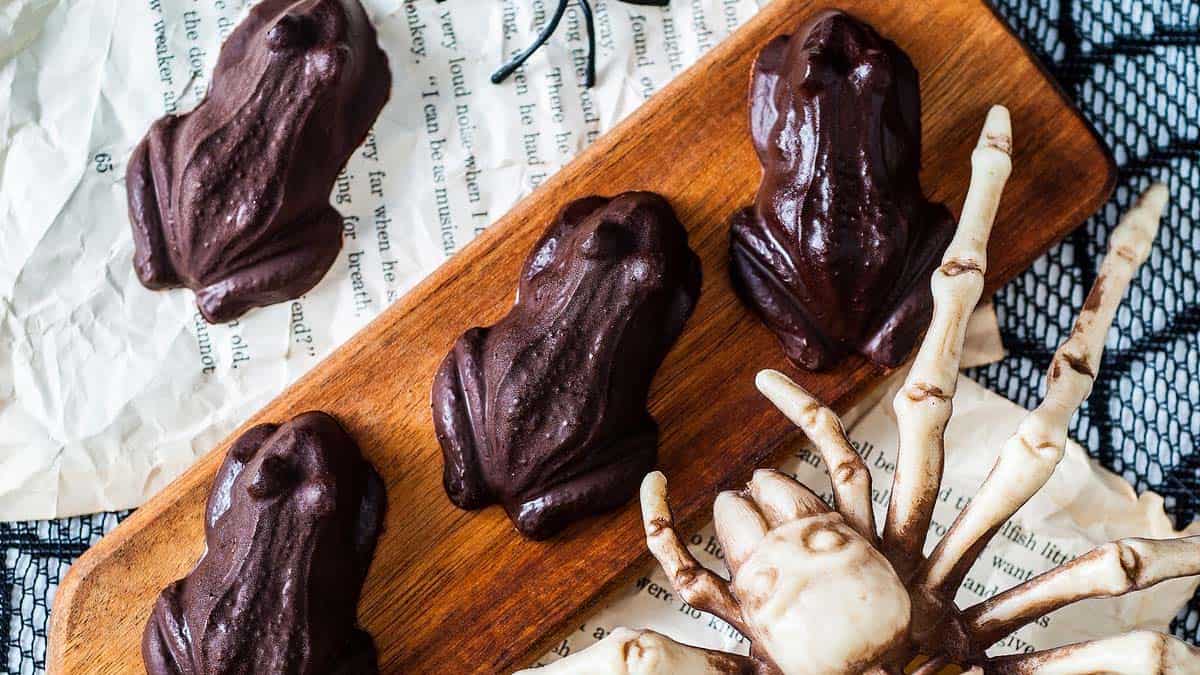 Top view of Harry Potter Chocolate Frogs on a wooden board.