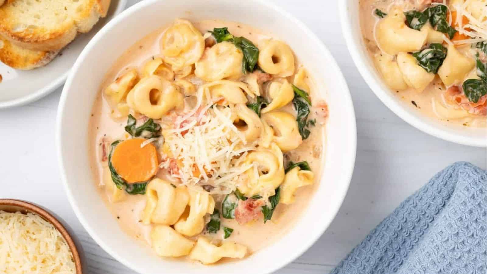 An overhead image of slow cooker tortellini soup in a bowl.