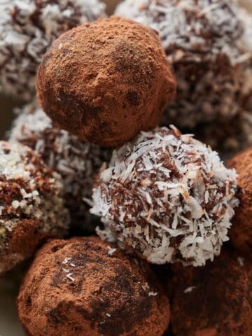 A close-up of a bowl filled with Chocolate Truffles.