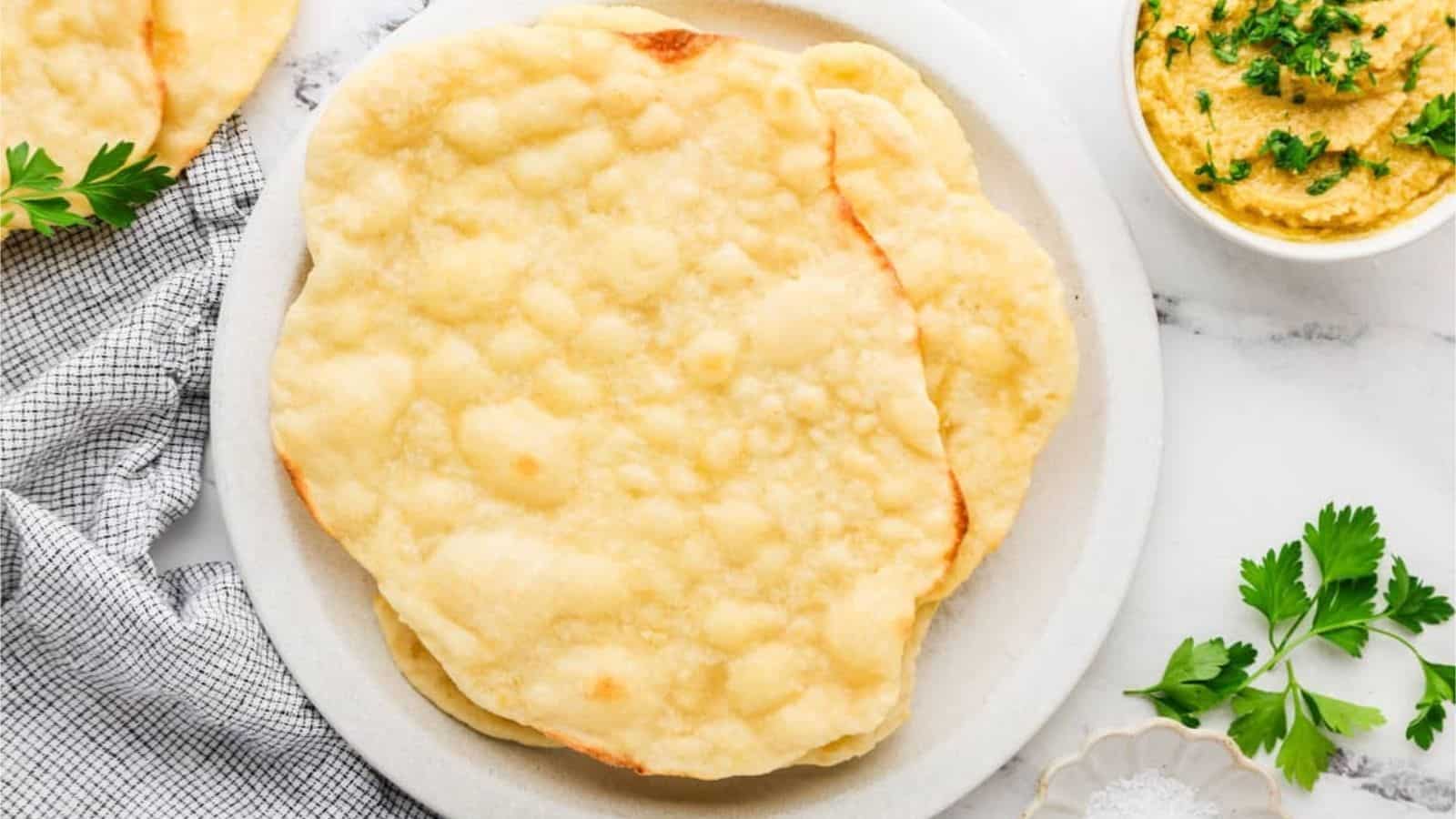An overhead image of the baked flatbread on a plate.